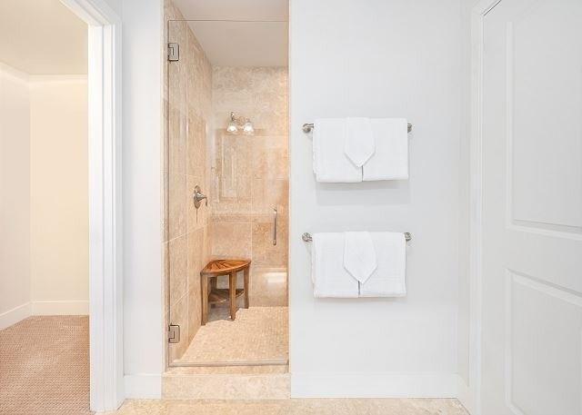 2611 Kiahuna Plantation Dr Unit 8J, Koloa, HI 96756 - bathroom with a stall shower and baseboards
