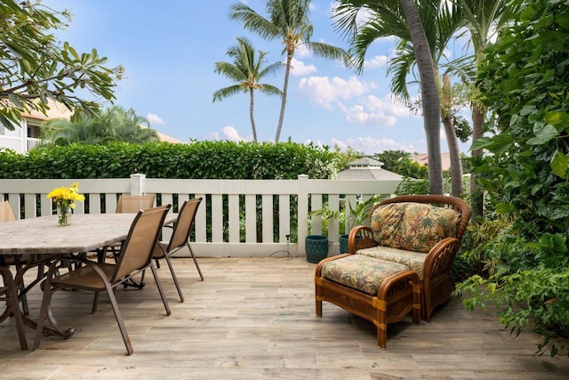 75-6081 Alii Dr Unit V101, Kailua-Kona, HI 96740 - wooden deck with outdoor dining area