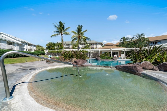 75-6081 Alii Dr Unit V101, Kailua-Kona, HI 96740 - swimming pool featuring a residential view and a patio area