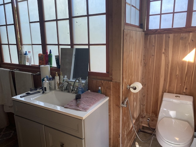 12-7022 Akanikolea St, Pahoa, HI 96778 - bathroom featuring vanity, wood walls, and toilet