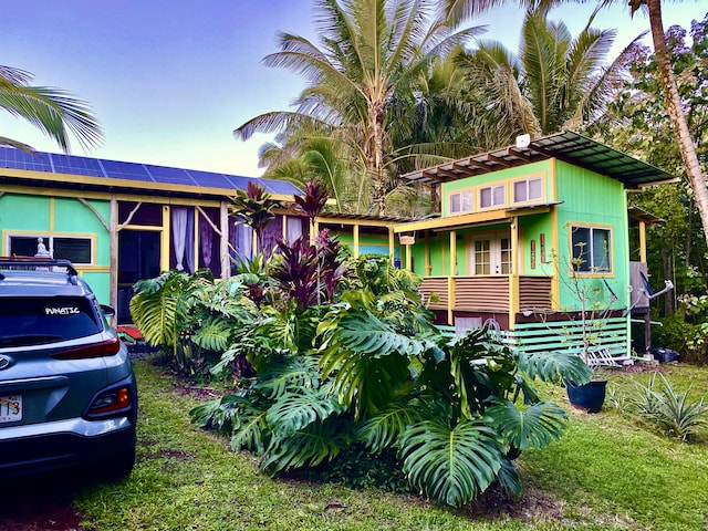 12-7022 Akanikolea St, Pahoa, HI 96778 - view of front of property with solar panels