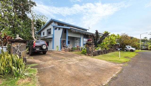 411 Molo St, Kapaa, HI 96746 - view of front of property with concrete driveway
