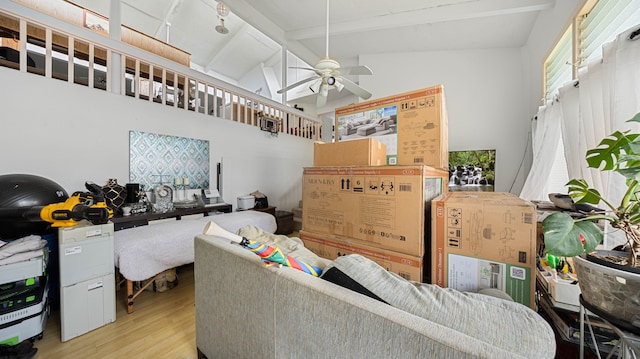 411 Molo St, Kapaa, HI 96746 - living room featuring wood finished floors, beamed ceiling, a ceiling fan, and high vaulted ceiling