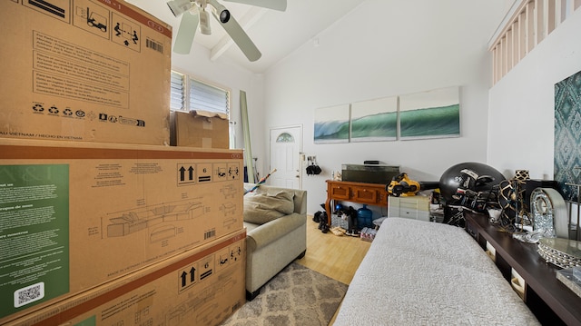 411 Molo St, Kapaa, HI 96746 - bedroom with wood finished floors, ceiling fan, and high vaulted ceiling