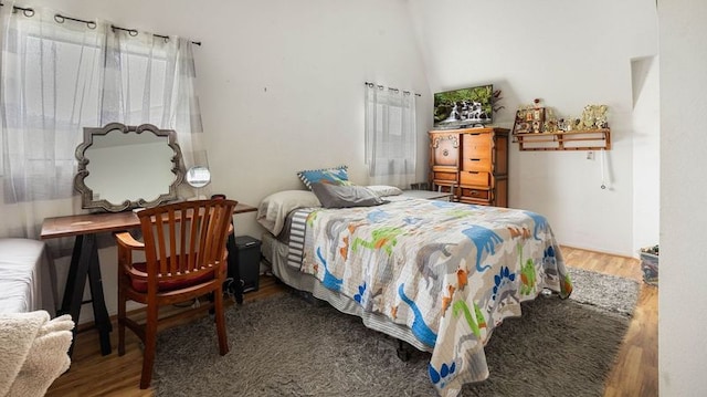 411 Molo St, Kapaa, HI 96746 - bedroom featuring wood finished floors and lofted ceiling