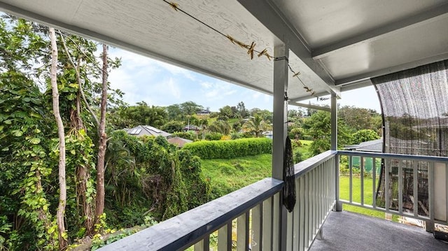 411 Molo St, Kapaa, HI 96746 - balcony featuring view of wooded area
