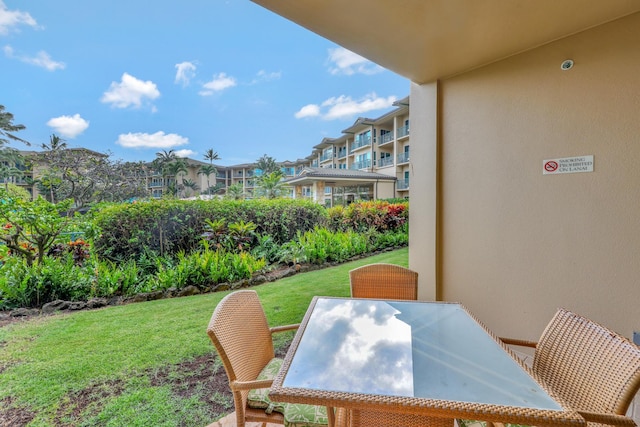 4-820 Kuhio Hwy Unit C104, Kapaa, HI 96746 - view of green lawn with outdoor dining area