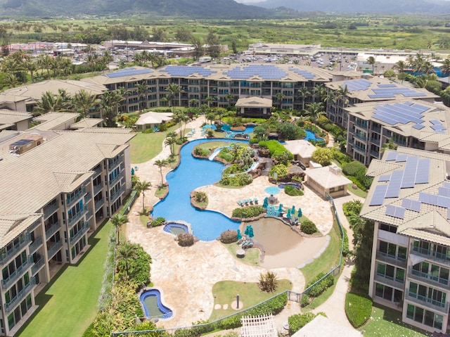 4-820 Kuhio Hwy Unit C104, Kapaa, HI 96746 - aerial view of a pool area and mountains