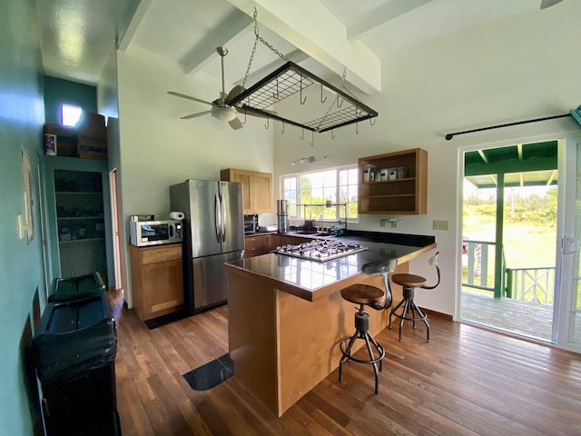 11-2747 Pikake St, Mountain View, HI 96771 - kitchen with stainless steel appliances, a towering ceiling, a ceiling fan, a breakfast bar, and beamed ceiling