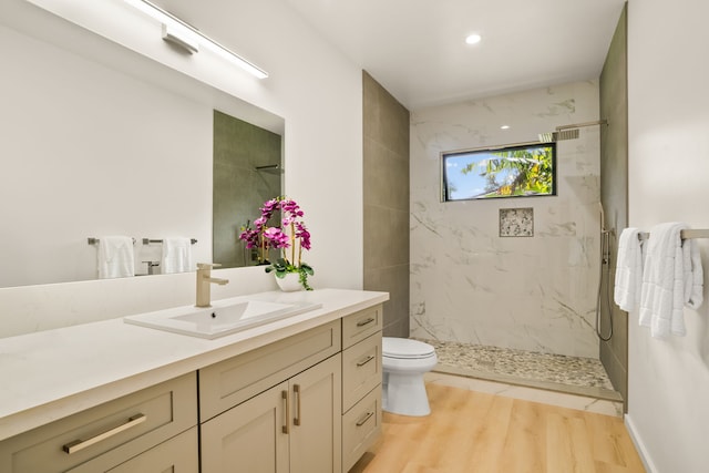 3973 Kalakaua Pl, Princeville, HI 96722 - full bathroom with vanity, a marble finish shower, toilet, wood finished floors, and recessed lighting