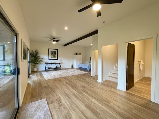 3973 Kalakaua Pl, Princeville, HI 96722 - living area featuring ceiling fan, light wood finished floors, stairs, and baseboards