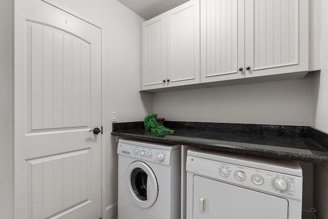 68-1118 N Kaniku Dr Unit 2104, Kamuela, HI 96743 - laundry area featuring washer and clothes dryer and cabinet space