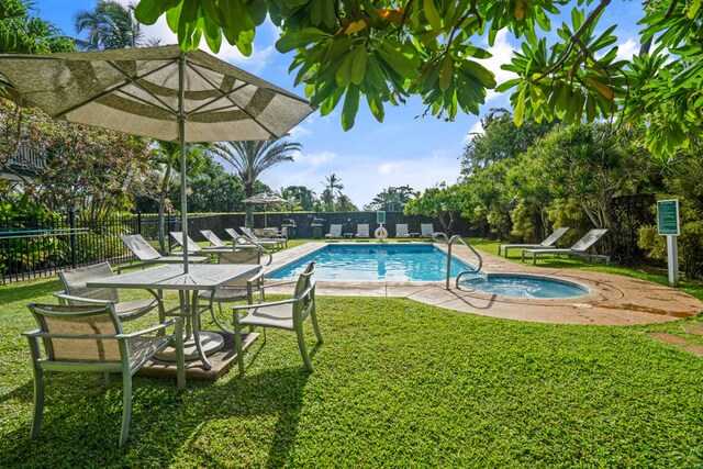 1831 Poipu Rd Unit 720, Koloa, HI 96756 - community pool with an in-ground hot tub and a patio area