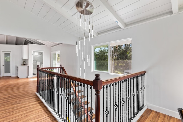 15-1632 6th Ave, Keaau, HI 96749 - corridor featuring an upstairs landing, light wood-style flooring, baseboards, and wooden ceiling