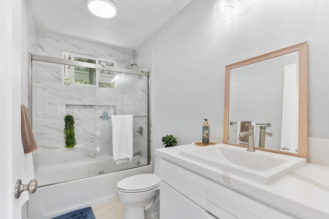 15-1632 6th Ave, Keaau, HI 96749 - bathroom featuring vanity, toilet, and bath / shower combo with glass door