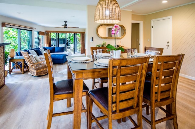 3920 Wyllie Rd Unit 9A, Princeville, HI 96722 - dining space featuring light wood finished floors, a ceiling fan, and crown molding
