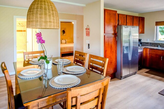 3920 Wyllie Rd Unit 9A, Princeville, HI 96722 - dining space featuring light wood-type flooring