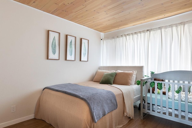 79-7199 Mamalahoa Hwy Unit 247, Holualoa, HI 96725 - bedroom featuring baseboards, wood finished floors, wooden ceiling, and multiple windows