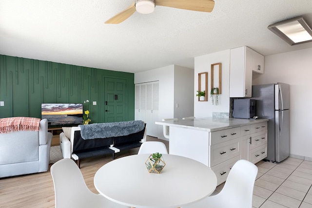 79-7199 Mamalahoa Hwy Unit 247, Holualoa, HI 96725 - dining space featuring a ceiling fan and a textured ceiling