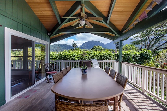 4446 Aku Rd, Hanalei, HI 96714 - deck featuring ceiling fan, a mountain view, and outdoor dining space