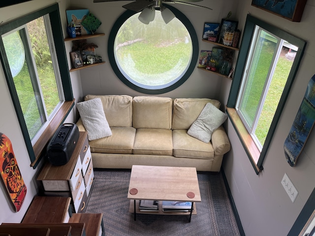 16-2000 Moho Rd, Mountain View, HI 96760 - carpeted living room with a ceiling fan