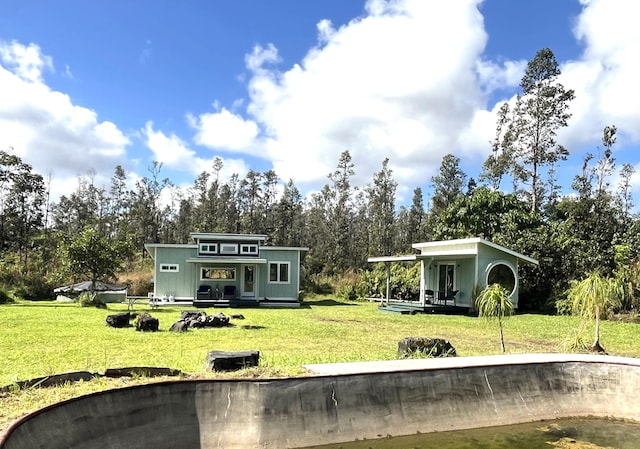16-2000 Moho Rd, Mountain View, HI 96760 - view of grassy yard featuring view of wooded area