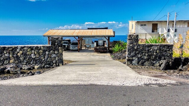 88-127 Kai Ave, Captain Cook, HI 96704 - view of community with driveway, a carport, and a water view