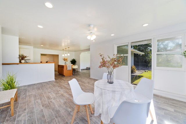 16-1321 Pohaku Cir, Keaau, HI 96749 - dining room featuring ceiling fan, light wood finished floors, recessed lighting, and baseboards