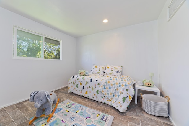 16-1321 Pohaku Cir, Keaau, HI 96749 - bedroom with wood tiled floors, recessed lighting, and baseboards