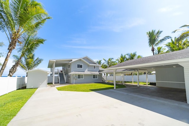 15-885 Paradise Ala Kai Dr, Keaau, HI 96749 - back of house featuring concrete driveway