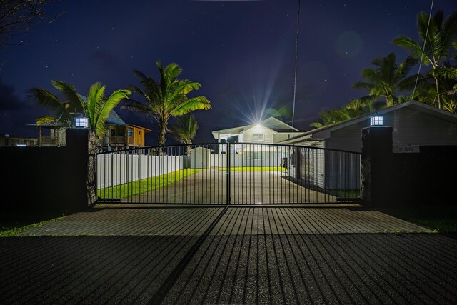 15-885 Paradise Ala Kai Dr, Keaau, HI 96749 - view of gate at night