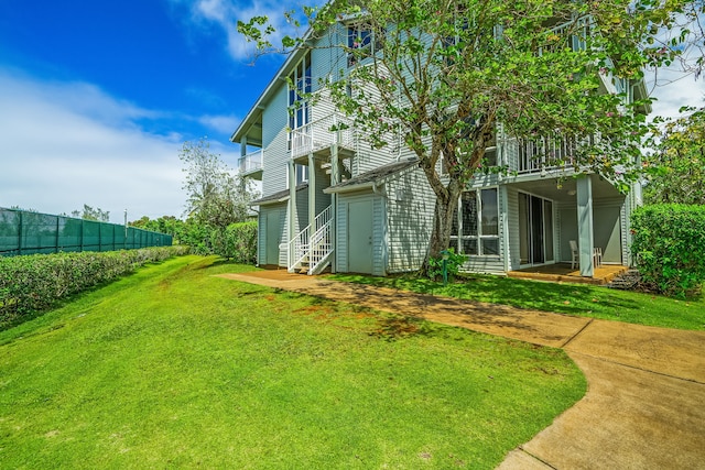 3811 Edward Rd Unit 2310, Princeville, HI 96722 - view of yard with a balcony