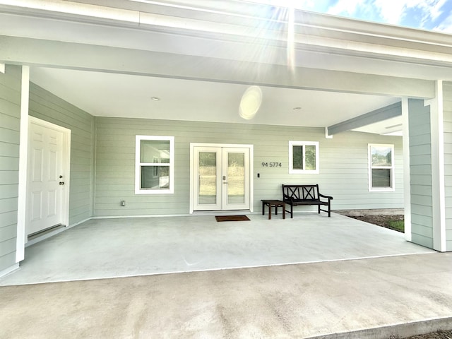 94-5774 Kalakau St, Naalehu, HI 96772 - view of patio / terrace featuring french doors