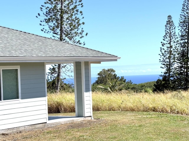 94-5774 Kalakau St, Naalehu, HI 96772 - exterior view of a shingled roof