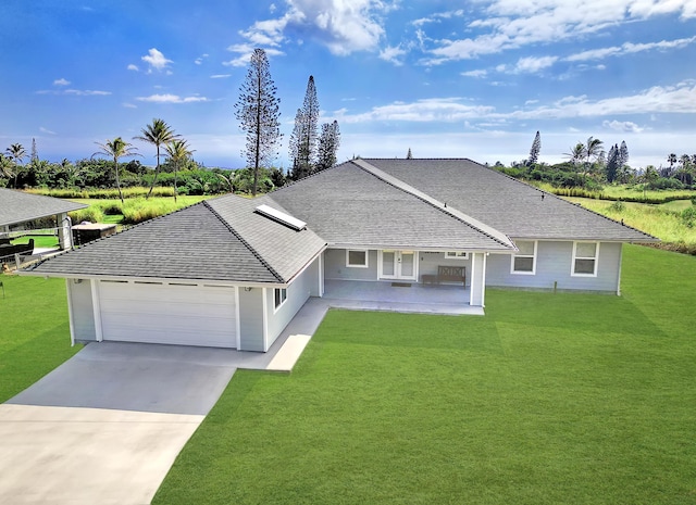 94-5774 Kalakau St, Naalehu, HI 96772 - ranch-style house with a garage, a front yard, concrete driveway, and roof with shingles