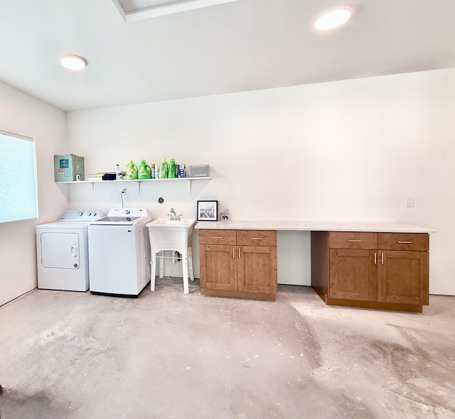 94-5774 Kalakau St, Naalehu, HI 96772 - washroom with cabinet space, washer and clothes dryer, and an office area