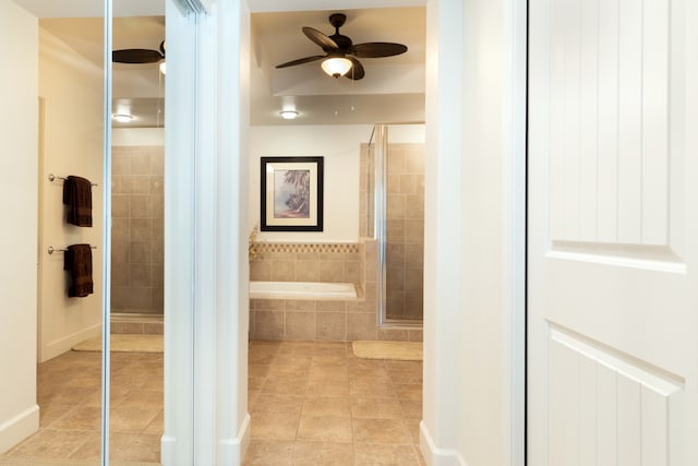 68-1118 Kaniku Dr Unit 404, Kamuela, HI 96743 - bathroom with tile patterned floors, ceiling fan, a garden tub, and tiled shower