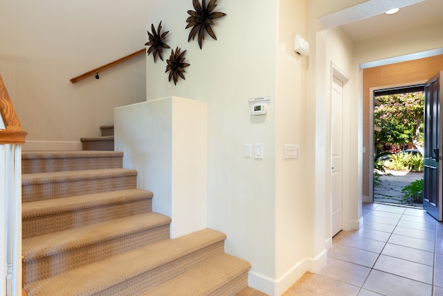 68-1118 Kaniku Dr Unit 404, Kamuela, HI 96743 - stairway featuring baseboards and tile patterned floors