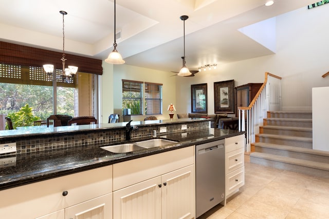 68-1118 Kaniku Dr Unit 404, Kamuela, HI 96743 - kitchen featuring stainless steel dishwasher, open floor plan, a sink, a chandelier, and light tile patterned floors