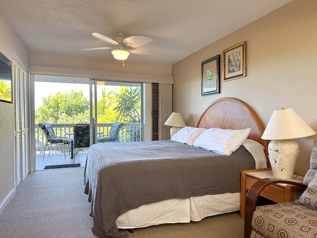 78-7039 Kamehameha Iii Rd Unit 25, Kailua-Kona, HI 96740 - bedroom with access to outside, carpet flooring, a textured ceiling, and a ceiling fan