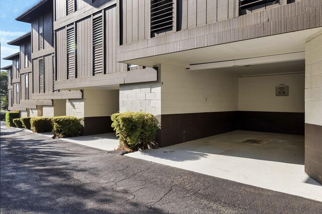 75-5855 Walua Rd Unit 15, Kailua-Kona, HI 96740 - view of home's exterior featuring a carport