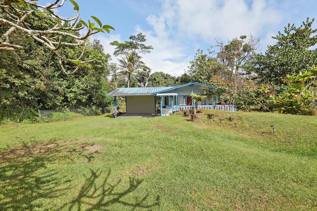 15-2737 Lai St, Pahoa, HI 96778 - view of yard with an attached carport and a porch