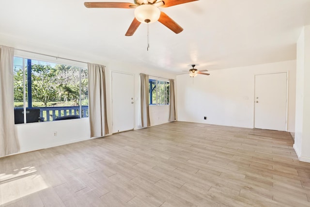 15-2737 Lai St, Pahoa, HI 96778 - spare room with a ceiling fan and light wood-style flooring