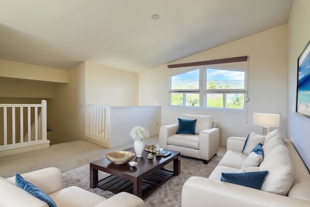 75-6060 Kuakini Hwy Unit E22, Kailua-Kona, HI 96740 - carpeted living room featuring vaulted ceiling