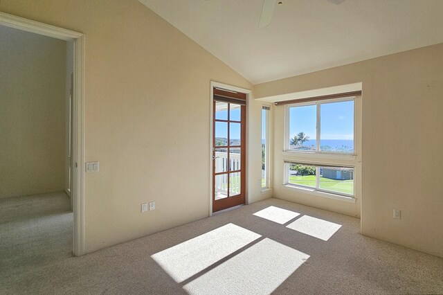 75-6060 Kuakini Hwy Unit E22, Kailua-Kona, HI 96740 - unfurnished room with carpet flooring, lofted ceiling, and ceiling fan