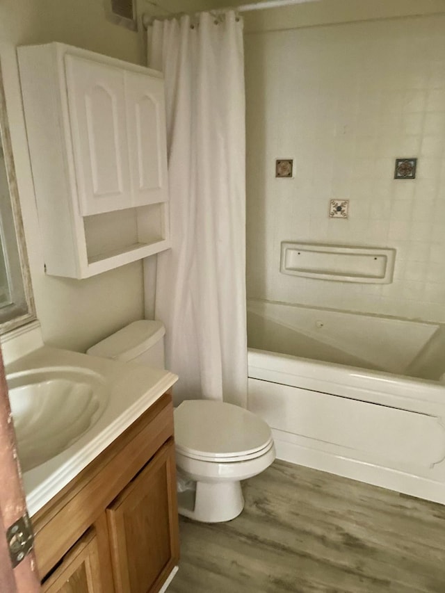 4461 Kamoa Rd Unit D12, Kapaa, HI 96746 - full bath with vanity, wood finished floors, shower / tub combo with curtain, and toilet