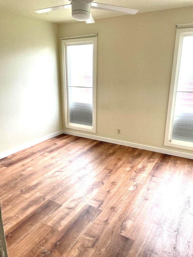 4461 Kamoa Rd Unit D12, Kapaa, HI 96746 - spare room featuring ceiling fan, wood finished floors, and baseboards