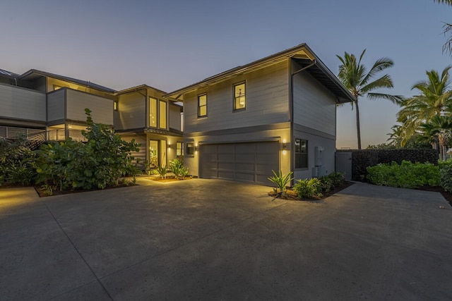 73-4780 Hinahina Rd Unit 24, Kailua-Kona, HI 96740 - modern home featuring an attached garage and concrete driveway