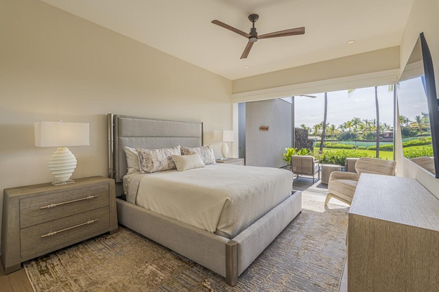 73-4780 Hinahina Rd Unit 24, Kailua-Kona, HI 96740 - bedroom with vaulted ceiling, access to exterior, a ceiling fan, and wood finished floors