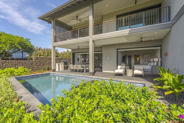 73-4780 Hinahina Rd Unit 24, Kailua-Kona, HI 96740 - rear view of house with a balcony, ceiling fan, stucco siding, a patio area, and an outdoor living space